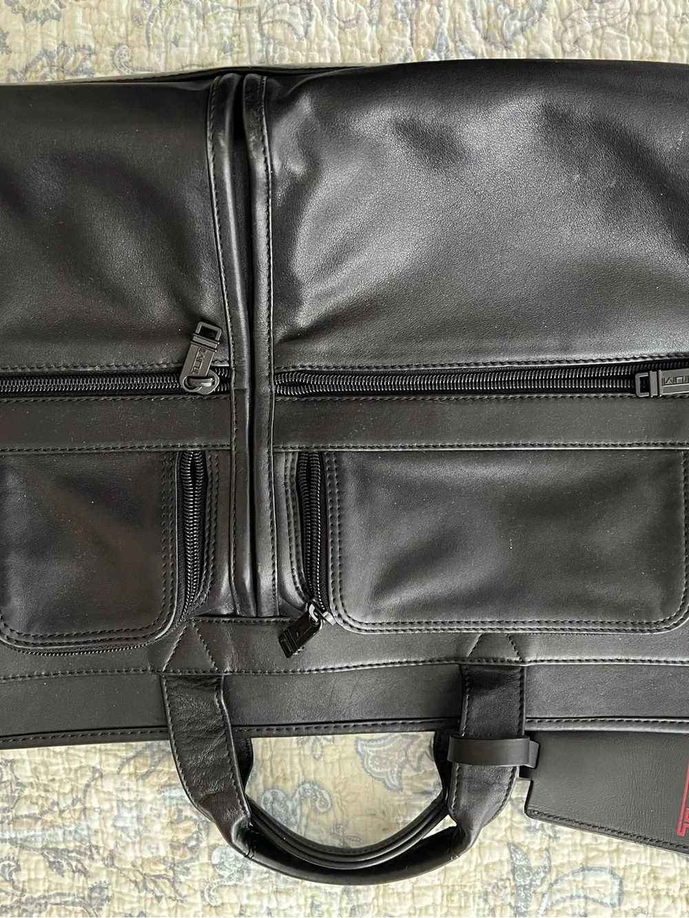 Tumi sleek leather